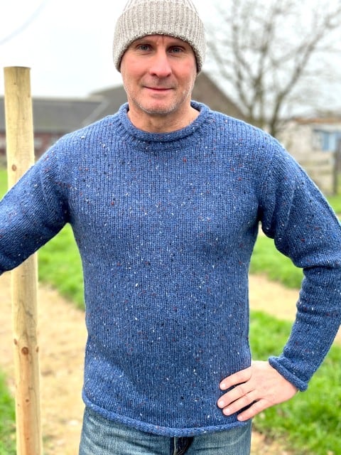 Herrenpullover aus Wolle blau meliert Herrenpullover aus Wolle blau meliert