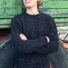Herrenpullover aus Wolle schwarz meliert