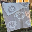 Wolldecke mit Schafmotiv beige natur